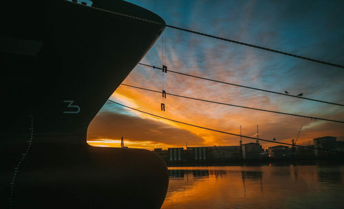 Silhouette of bridge against sky during sunset