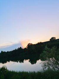 Scenic view of silhouette trees against sky during sunset