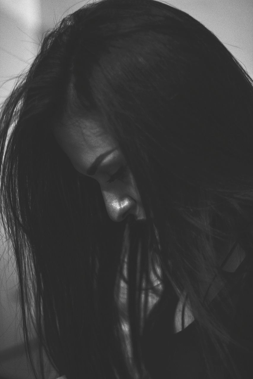 hair, one person, long hair, hairstyle, headshot, portrait, real people, young women, indoors, close-up, women, lifestyles, young adult, looking, black hair, leisure activity, looking away, females, home interior, human hair, beautiful woman, mouth open, human face, contemplation