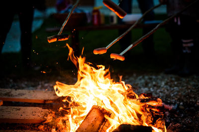 Sausages on bonfire