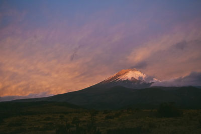 Scenic view of mountains against sky during sunset