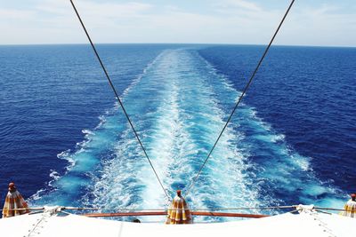 High angle view of ship and wake on sea