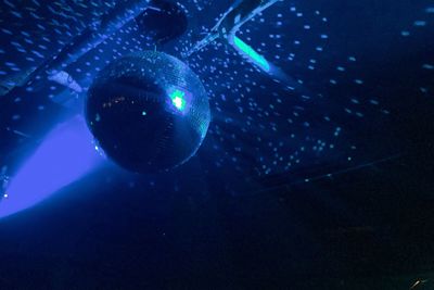 Close-up of illuminated lighting equipment in water