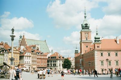 Buildings in city against sky