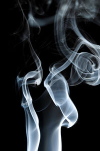 Close-up of smoke against black background