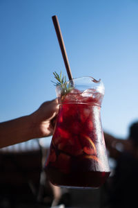 Close-up of hand holding drink