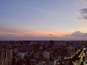 High angle view of cityscape against sky during sunset