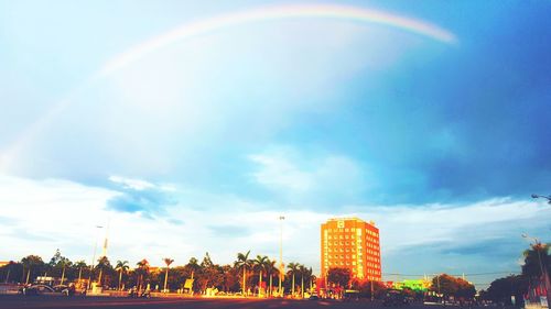 Rainbow over city