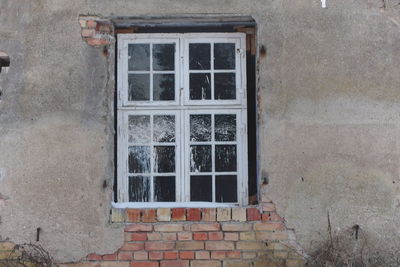Closed window of old building