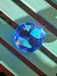 High angle view of bubble on glass table