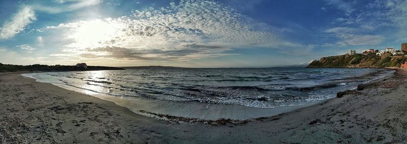 Scenic view of beach against sky