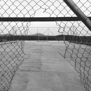 Chainlink fence against sky