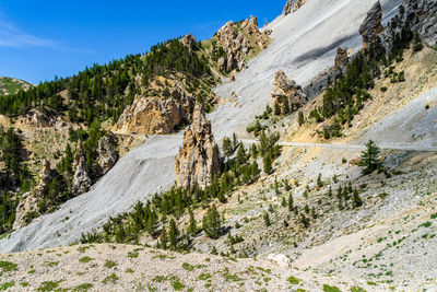 The scenic landscape of the casse deserte en route to the col d'izoard, france