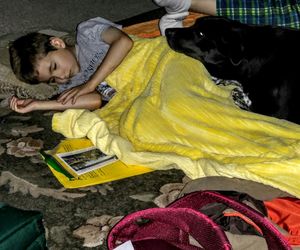 Man sleeping dog