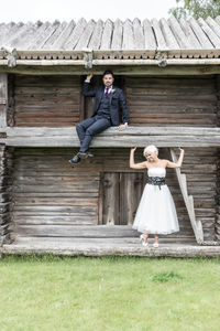 Smiling bride outside barn