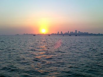 Scenic view of sea at sunset