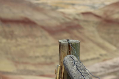 Close-up of old wooden post
