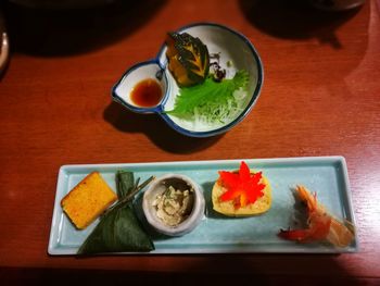 High angle view of sushi served on table