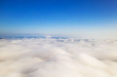 Aerial view beautiful of morning scenery sea of cloud and the fog flows on high mountains.