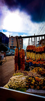 Street market against buildings in city