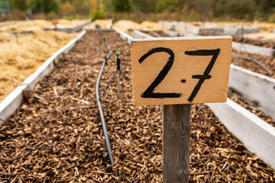 Close-up of sign on road