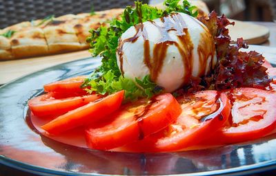 Close-up of burger in plate on table