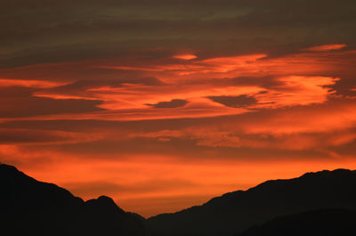 Low angle view of dramatic sky during sunset