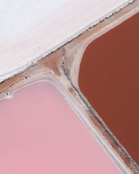 High angle view of parasol on land against sky