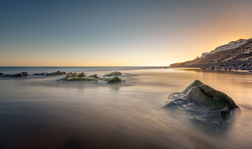 Scenic view of sea against clear sky