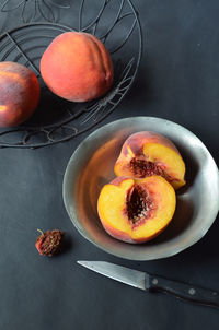 High angle view of fresh peaches in plate