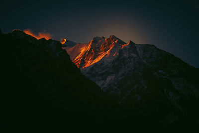 Scenic view of volcanic mountain against sky