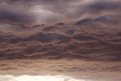 Low angle view of dramatic sky during sunset