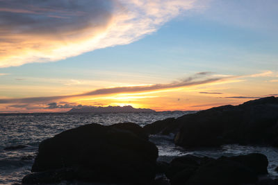 Scenic view of sea against sky during sunset