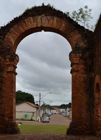 Built structure against cloudy sky