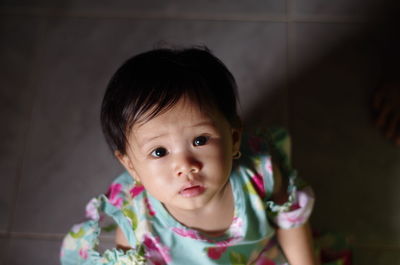 Portrait of cute baby at home