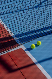 High angle view of yellow ball on bed