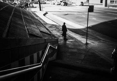 High angle view of man walking on steps