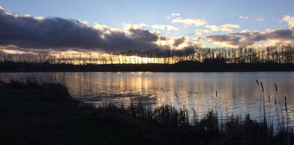 Scenic view of lake during sunset