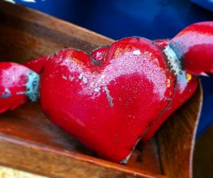 Close-up of red tomato on table