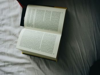 High angle view of open book on table