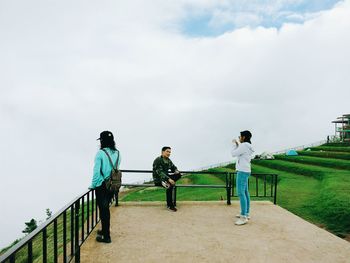 Rear view of man standing on observation point