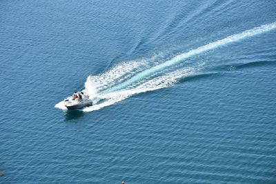 High angle view of boat sailing on sea