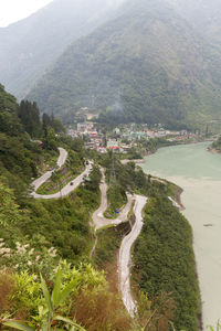 High angle view of road by mountains