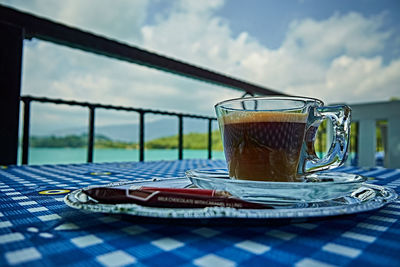 Close-up of coffee cup on table