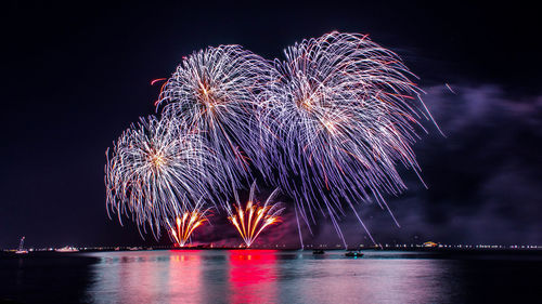 Firework display at night