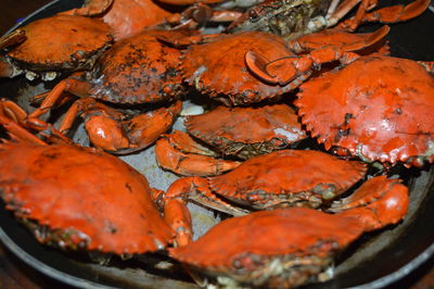High angle view of crabs in cooking pan