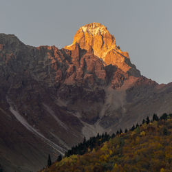 Scenic view of rocky mountains against sky