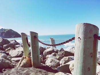 Scenic view of sea against clear blue sky