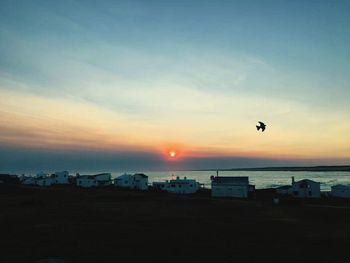 View of beach at sunset