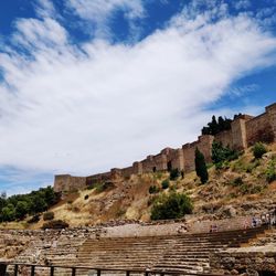 View of old ruin building against cloudy sky